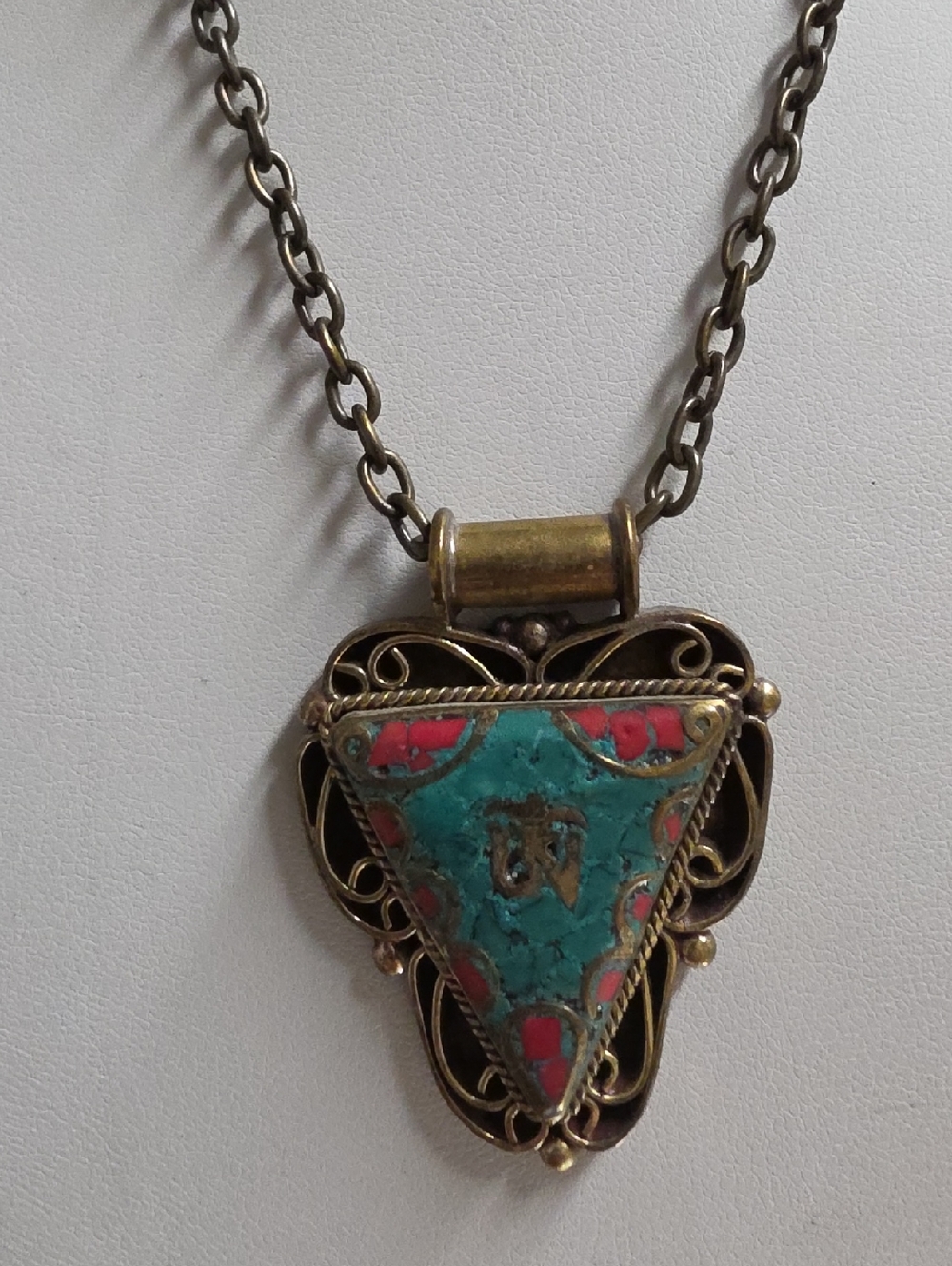 Turquoise and Coral Inlaid Triangle Pendant w Om Mantra Brass Necklace